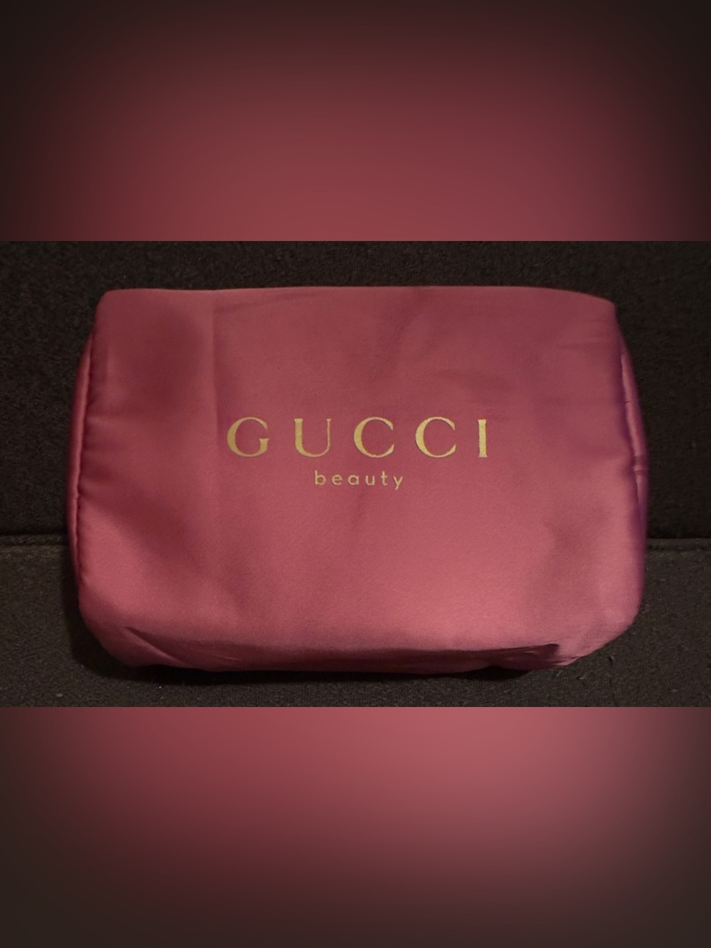 Gucci Pink Satin Beauty Pouch with Gold Logo. 7”W x 6 1/2” H.